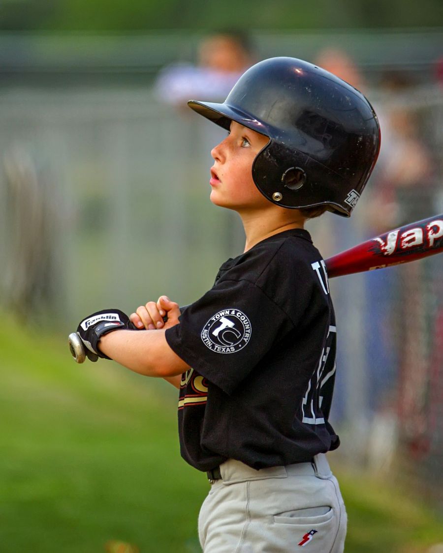 Eli waiting to bat during a baseball game